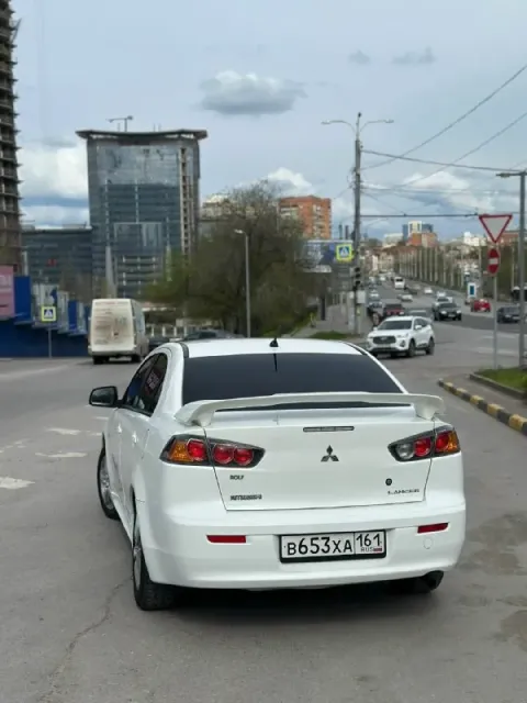 Лансер 2010 год продаю отличный автомобиль, очень красивый и привлекательный автомобиль, состояние к... - фотография